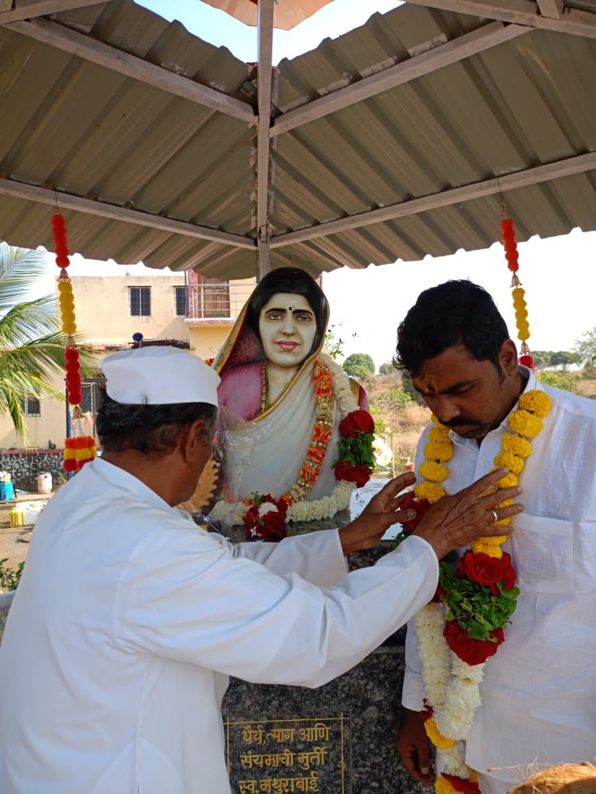 Floral garland on statue